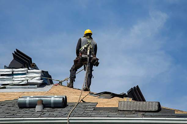 Professional Roofing technician working in Flowood, MS